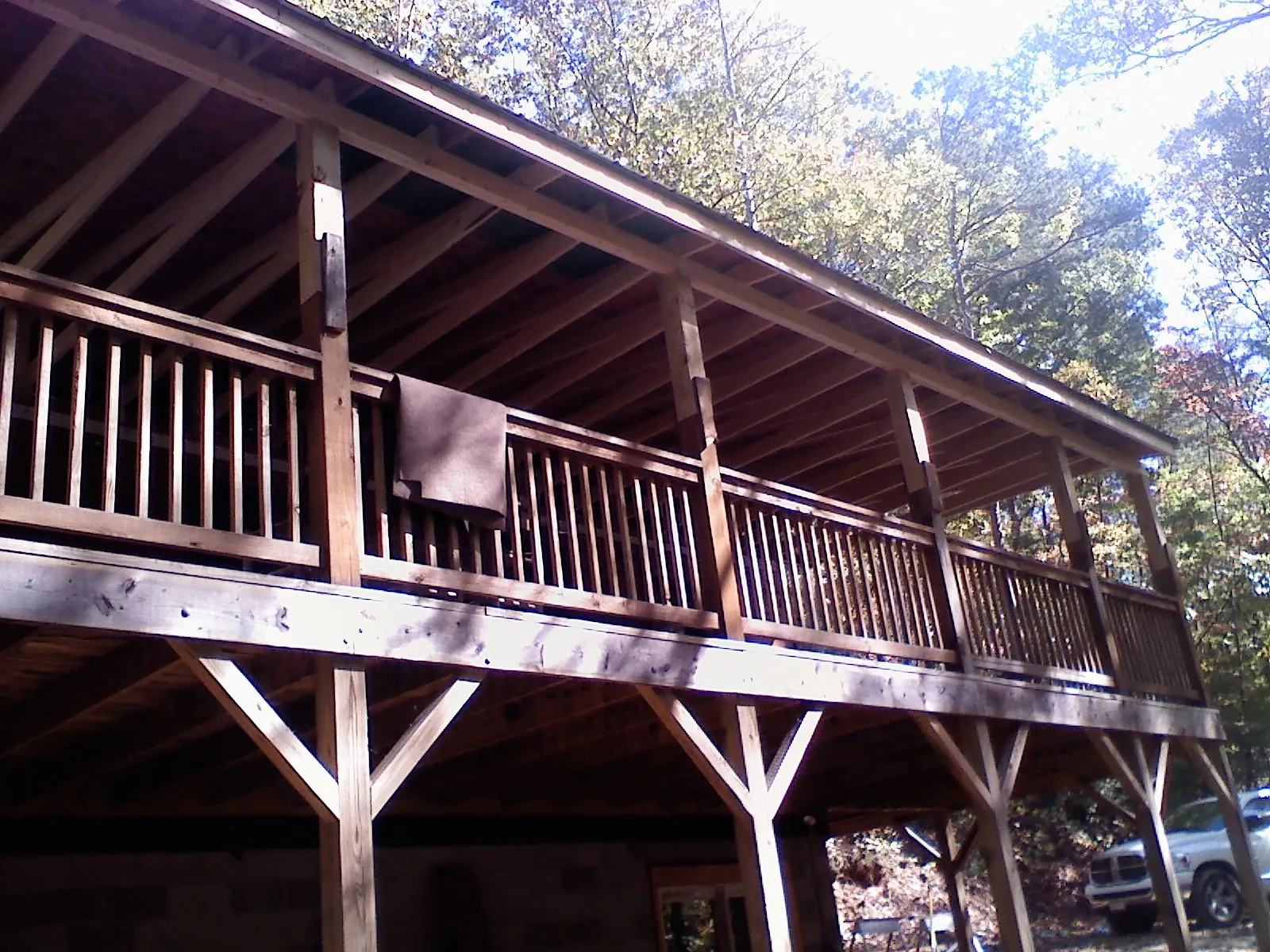 Timber framing under a new elevated porch and deck — Roof Leak Repair in Commodore by Roofing Brothers